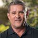 Headshot of Glen Schofield smiling.